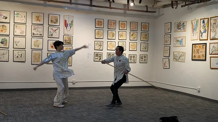 A sword exchange mid-form