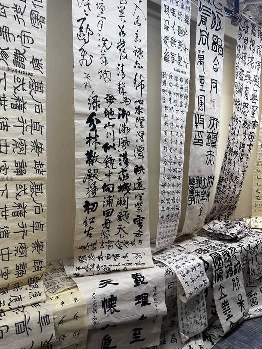 Scrolls of calligraphy overhead