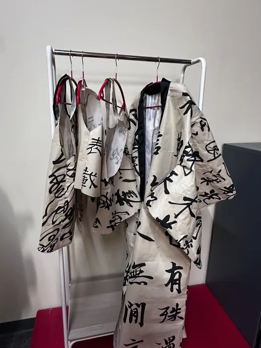 Calligraphy-printed robes ready to try on