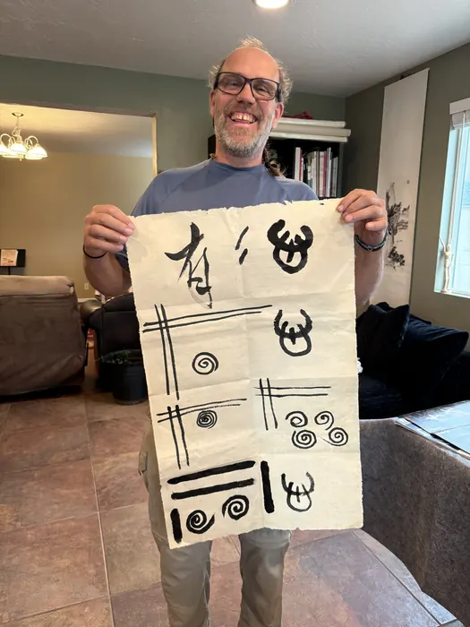 A student with his finished piece