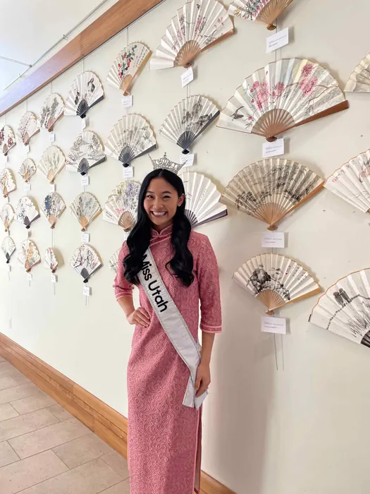 A guest beside the fan display