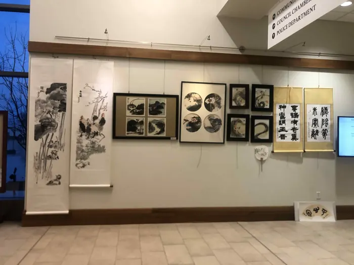 Scrolls and framed paintings in the hall